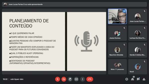Print da deta do google meet a qual mostra no canto esquerdo a tela de um slide e no canto direito os participantes e ministrante da oficina.
